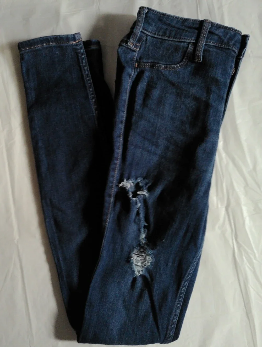 Hollister Dark Indigo Skinny Jeans with Distressed Knee